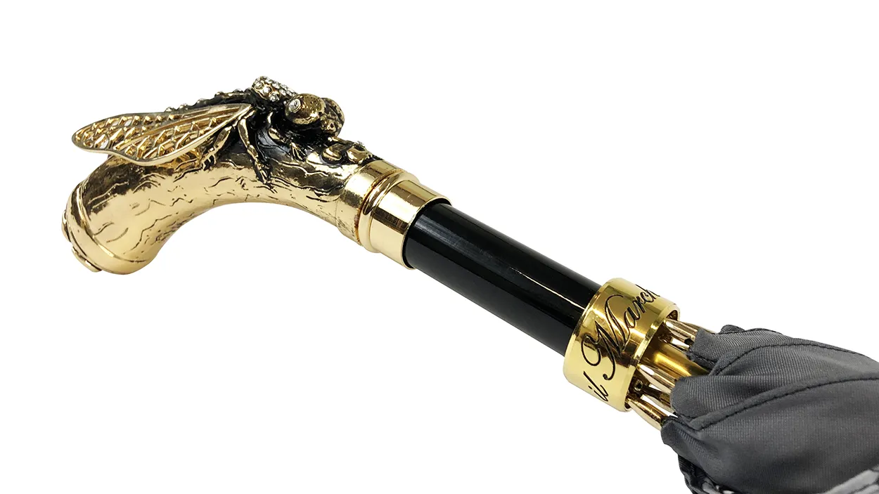 Elegant handcrafted umbrella with dragonfly