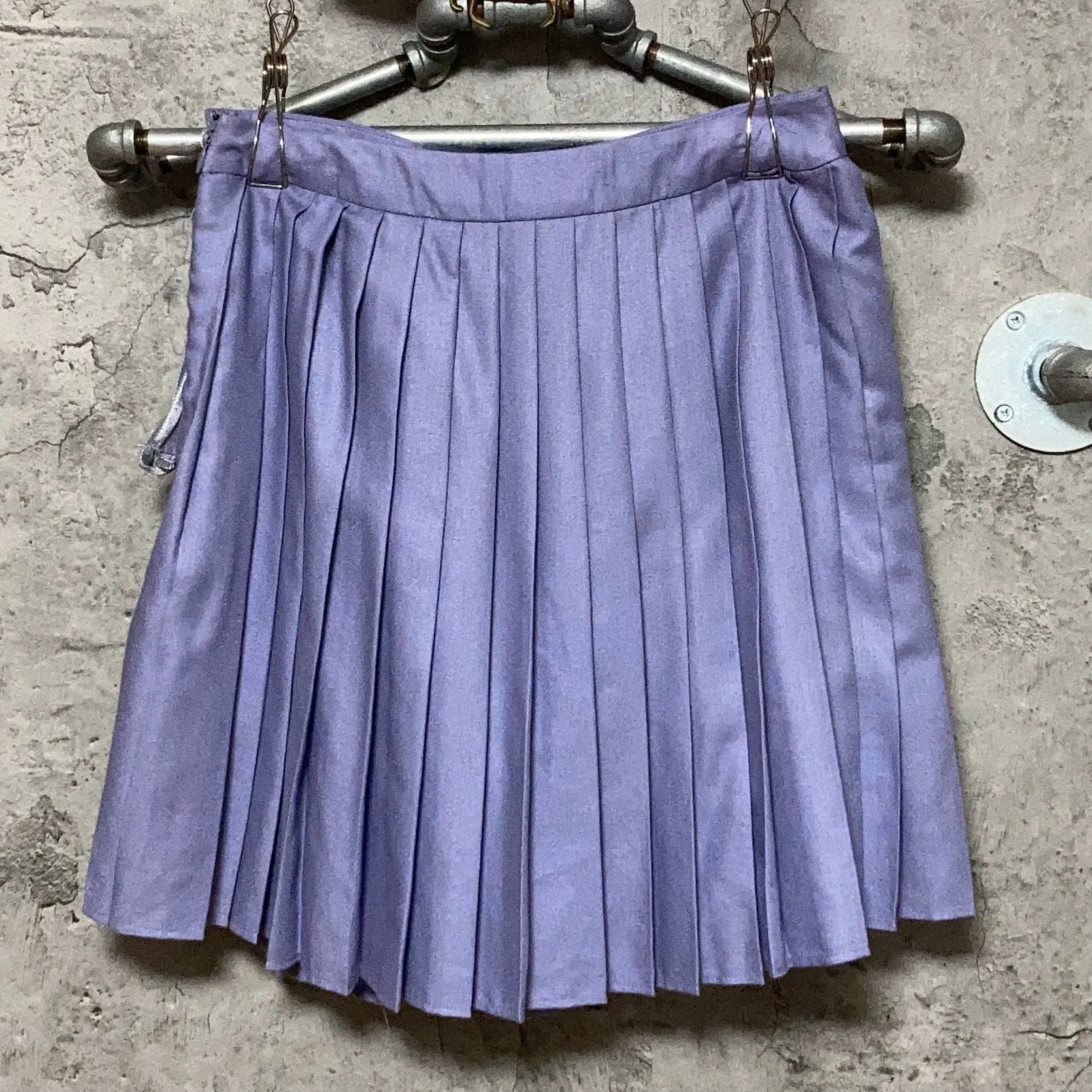 purple pleated skirt