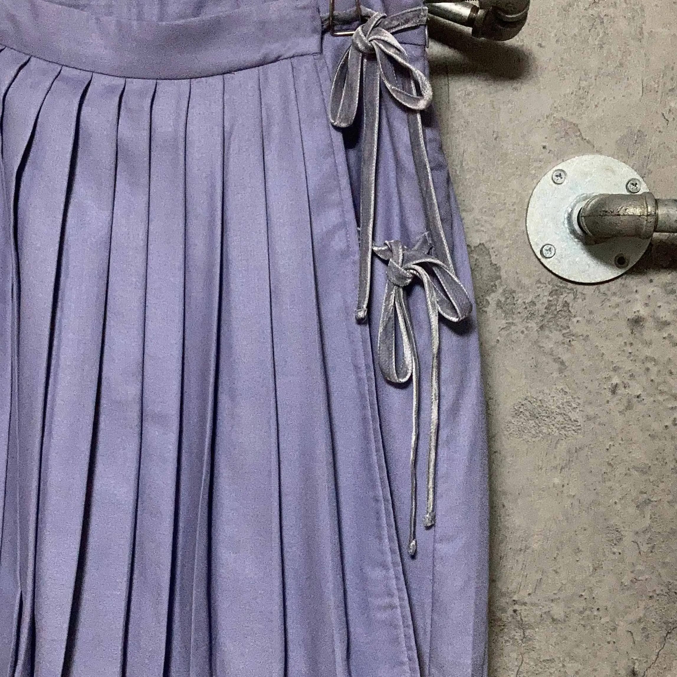 purple pleated skirt